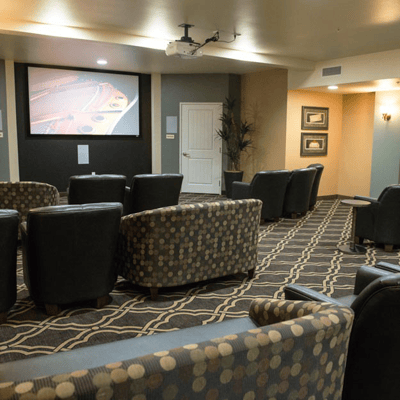 Interior view of a cozy common area with seating