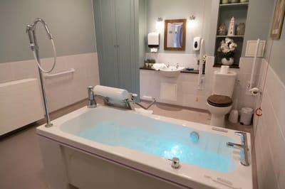 Modern bathroom with a whirlpool tub and sink