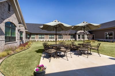 Outdoor courtyard with seating and umbrellas