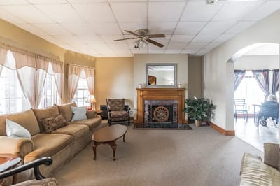Cozy common area with comfortable seating and a fireplace