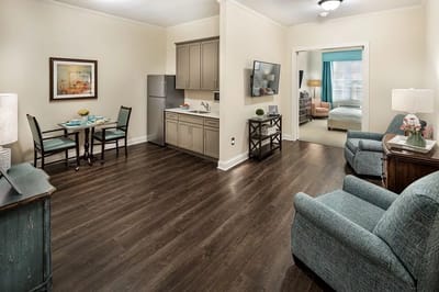 Interior view of a resident's living space with kitchen area