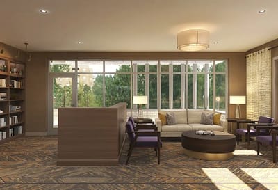 Modern common area with seating and natural light