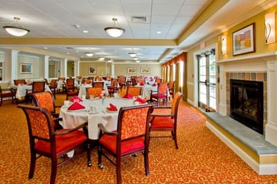 Dining room with elegant table settings and chairs