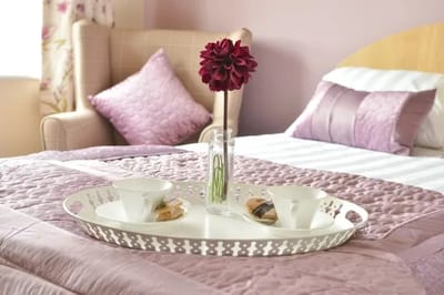 Cozy resident room with decorative elements and snacks