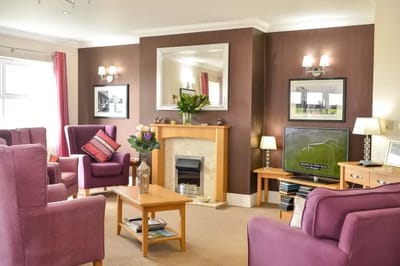 Bright common area with comfortable seating and decor