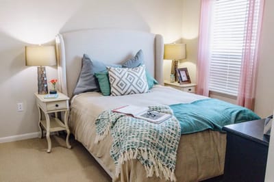 Cozy private room with a bed and decor