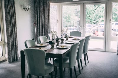 Dining area set with plates and decor