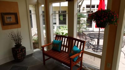 Cozy indoor seating area with garden view
