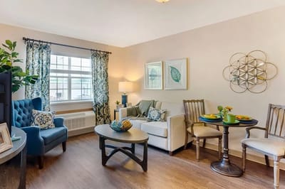 Cozy living room setup in a resident suite
