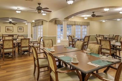 Dining area with arranged tables and chairs