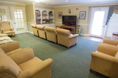 Interior view of a cozy common area with seating