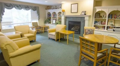 Common area with seating and a fireplace
