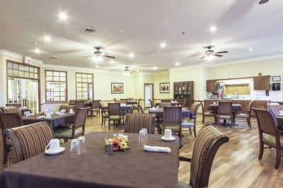 Dining room with tables set for meals