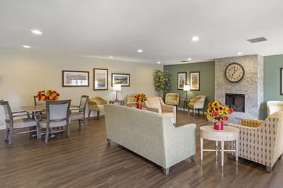 A cozy lounge area in a senior living facility