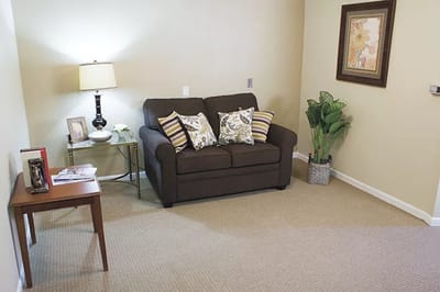 Cozy interior space with a sofa and lamp