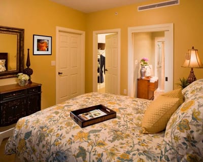 Cozy private resident room with floral bedding