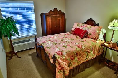 Cozy private bedroom with floral bedding