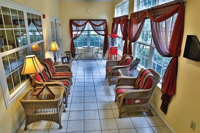 Bright common area with comfortable seating and decor