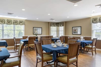 Bright dining area with tables and chairs