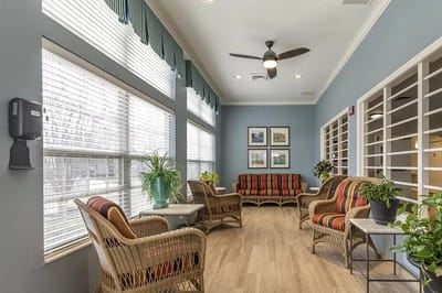 Bright common area with seating and plants