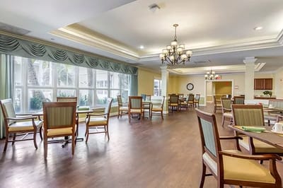 Bright dining area with tables and chairs
