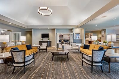 Bright common area with seating and decor