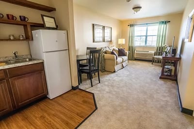 Cozy interior of a resident room with kitchenette