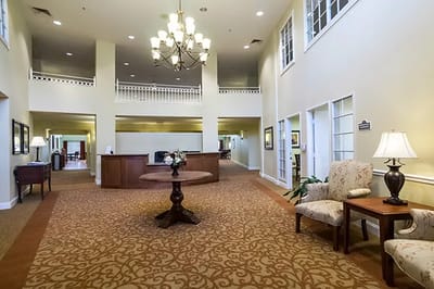Spacious lobby area with seating and decor