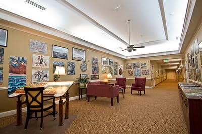 Common area with seating and artwork on the walls