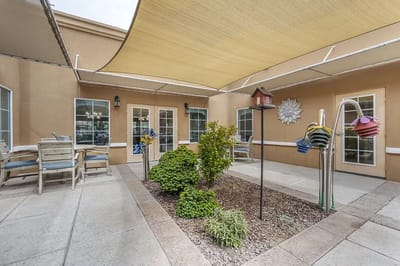 Outdoor courtyard with seating and decorative elements