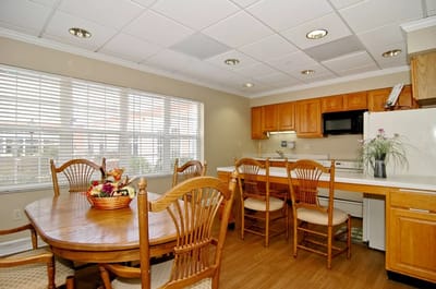 Bright dining area with wooden table and chairs