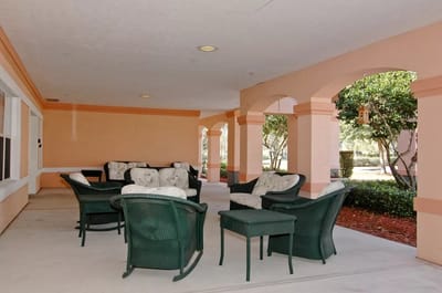 Outdoor seating area with wicker furniture