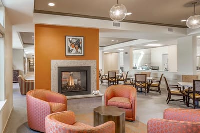Common area with seating and a fireplace