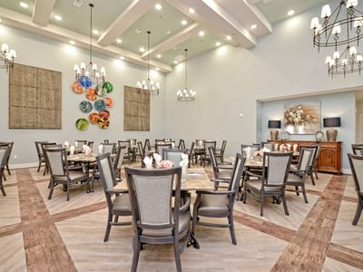 Dining room with tables and chairs set up