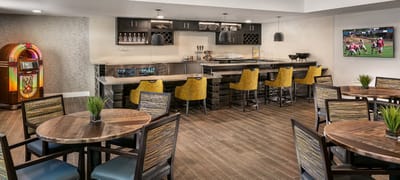 Interior dining area with tables and bar seating