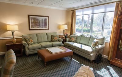 Cozy common area with seating and natural light
