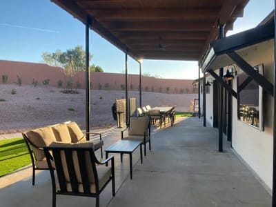 Outdoor seating area with chairs and table