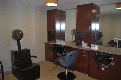 Interior view of a salon area with styling stations