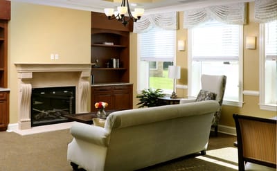 Cozy common area with a fireplace and seating