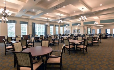 Dining room with tables and chairs set up