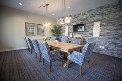 Bright interior common area with dining table