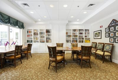 Common area with bookshelves and seating