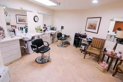 Interior view of the hair salon with styling chairs and mirrors