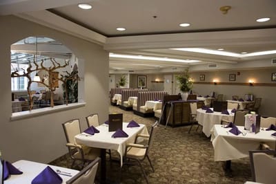 Elegant dining room setup with tables and decor