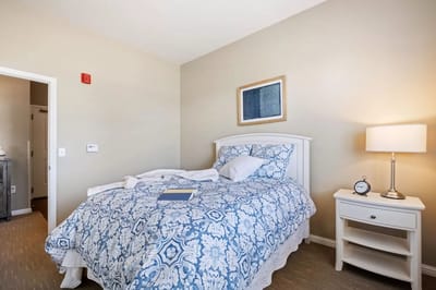 Cozy resident room with a bed and decor