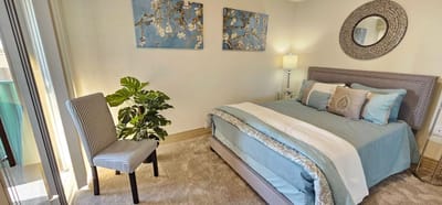 Cozy resident room with comfortable bed and decor