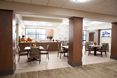 Bright dining area with tables and seasonal decorations