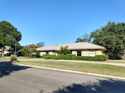 Exterior view of a single-story senior living facility