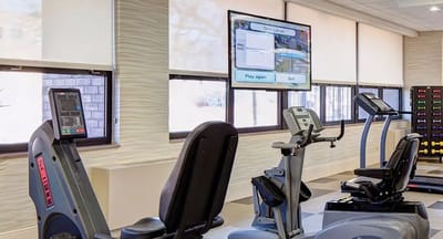 Interior view of a fitness area with exercise equipment
