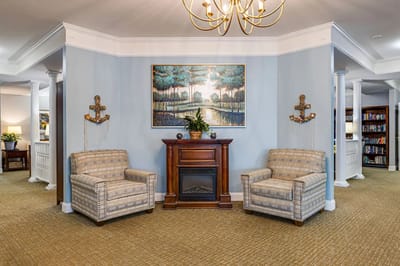 Cozy common area with seating and artwork